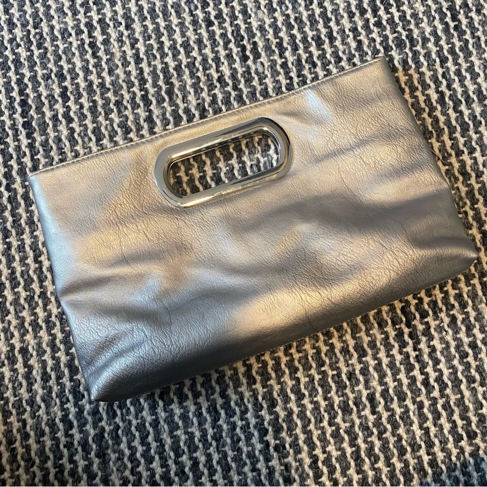 Silver clutch with attachable silver strap